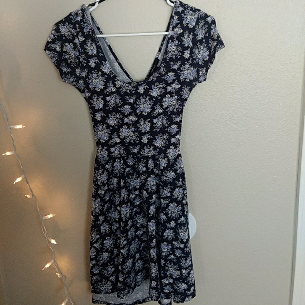 Gorgeous and trendy floral criss cross back dress